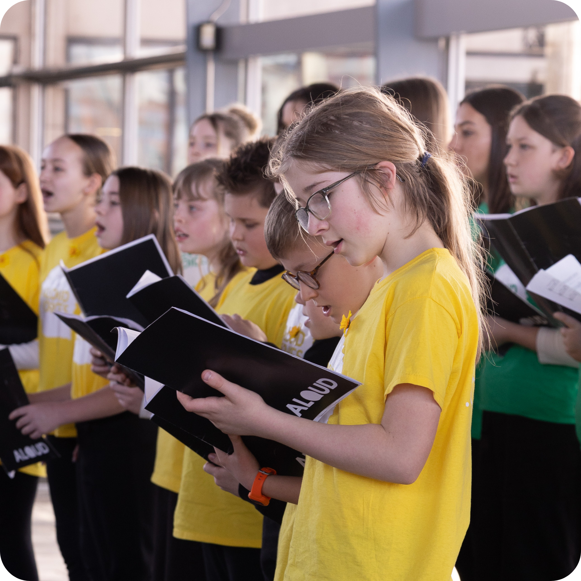 A primary school choir performs at a St Davids Day event in the Senedd